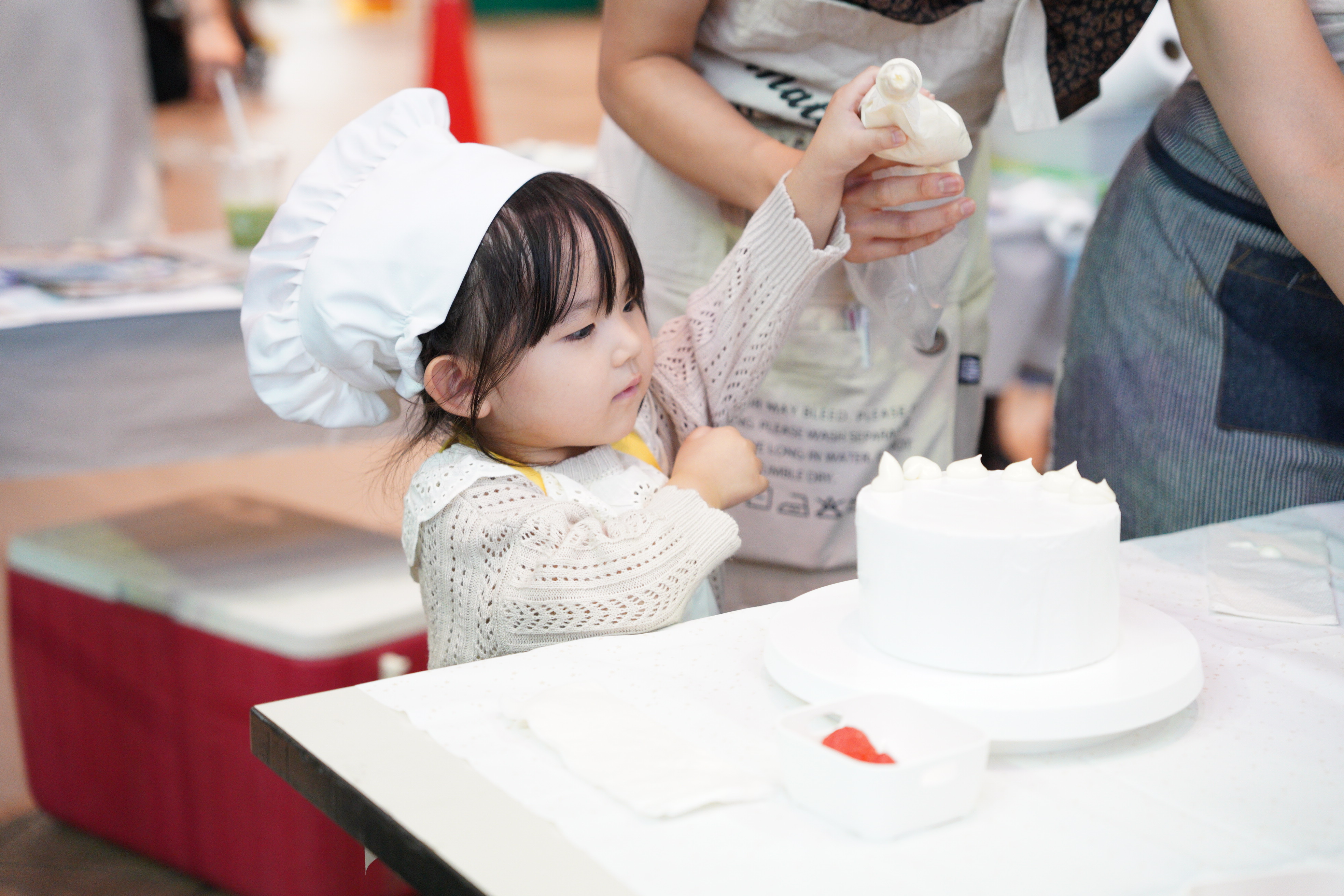 職業体験ブースには子どもたちの行列ができ大盛況