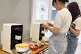 【学校法人OCC 大阪キリスト教短期大学】日本初!? 大学の学生食堂に話題の「漢江ラーメン」が出現! 辛ラーメンの自動販売機と本場のラーメン調理器を導入し7月1日に提供開始