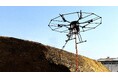 東興ジオテックとエアロセンス、国内初となる法面吹付用の大型有線給電ドローンと吹付工法を共同開発