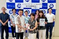 「KOZA ROCK REVOLUTION」の売上の一部を沖縄市社会福祉協議会へ寄付