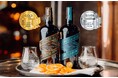 「のとジン」シリーズを企画販売しているNTGが輸入したウェールズ産の「パロ・コルタード・カスク・エイジド・ジン」がTWSC2026で金賞、「シグネチャ・スタイル・ジン」が銀賞を受賞の快挙