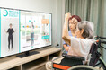 AIとテレビを活用した「介護向けAIトレーナー」の実証を介護施設で実施