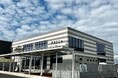 企業施設内の24時間フィットネスジムエニタイムフィットネス「村崎野NEILo店」が入る地域に開かれたTDK企業寮「NEILo(ねいろ)」の完成披露式開催