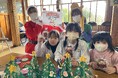 ダイナム、全国の子ども食堂等96施設、約7,000人へクリスマスプレゼントを訪問寄贈