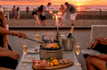 鎌倉・由比ヶ浜の海の家「BBQ SEASIDE LOUNGE」酷暑の昼間を避けて、アフター6を更に楽しめる限定の新クーポン誕生！ 8名様以上でスパークリングワイン1本、16名様以上で2本をプレゼント