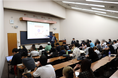 トレイダーズ証券:明治学院大学にて関東財務局から講師をお招きし初めての大学生向け金融経済教育の出張授業を実施
