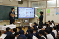 トレイダーズ証券:渋谷区立長谷戸小学校にて外国為替ディーラー内田が金融経済教育の出張授業を行いました。