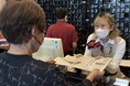 新聞週間に合わせて温泉施設から届ける地域還元企画。瀬戸大橋温泉やま幸で『山陽新聞』200部を無料配布
