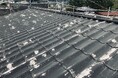 中東情勢の悪化による塗料不足の不安に対応できる、瓦の破砕材を利用した水性の屋根・壁用塗料「やねっこ」。