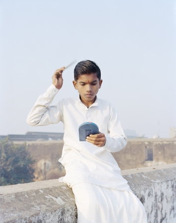 Rama Combing His Hair, Ayodhya, India, 2015 ©Vasantha Yogananthan