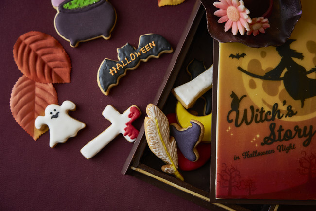 本型のチョコレートボックスに詰め込んだ可愛らしいアイシングクッキー
