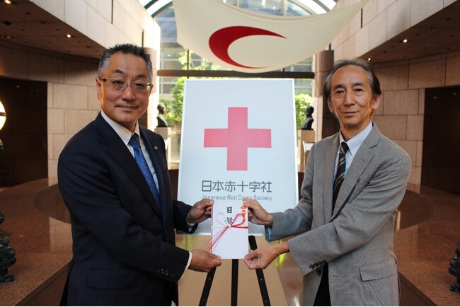 （左）相澤達也 日本赤十字社パートナーシップ推進部長　（右）大内眞人 JFN事務局長