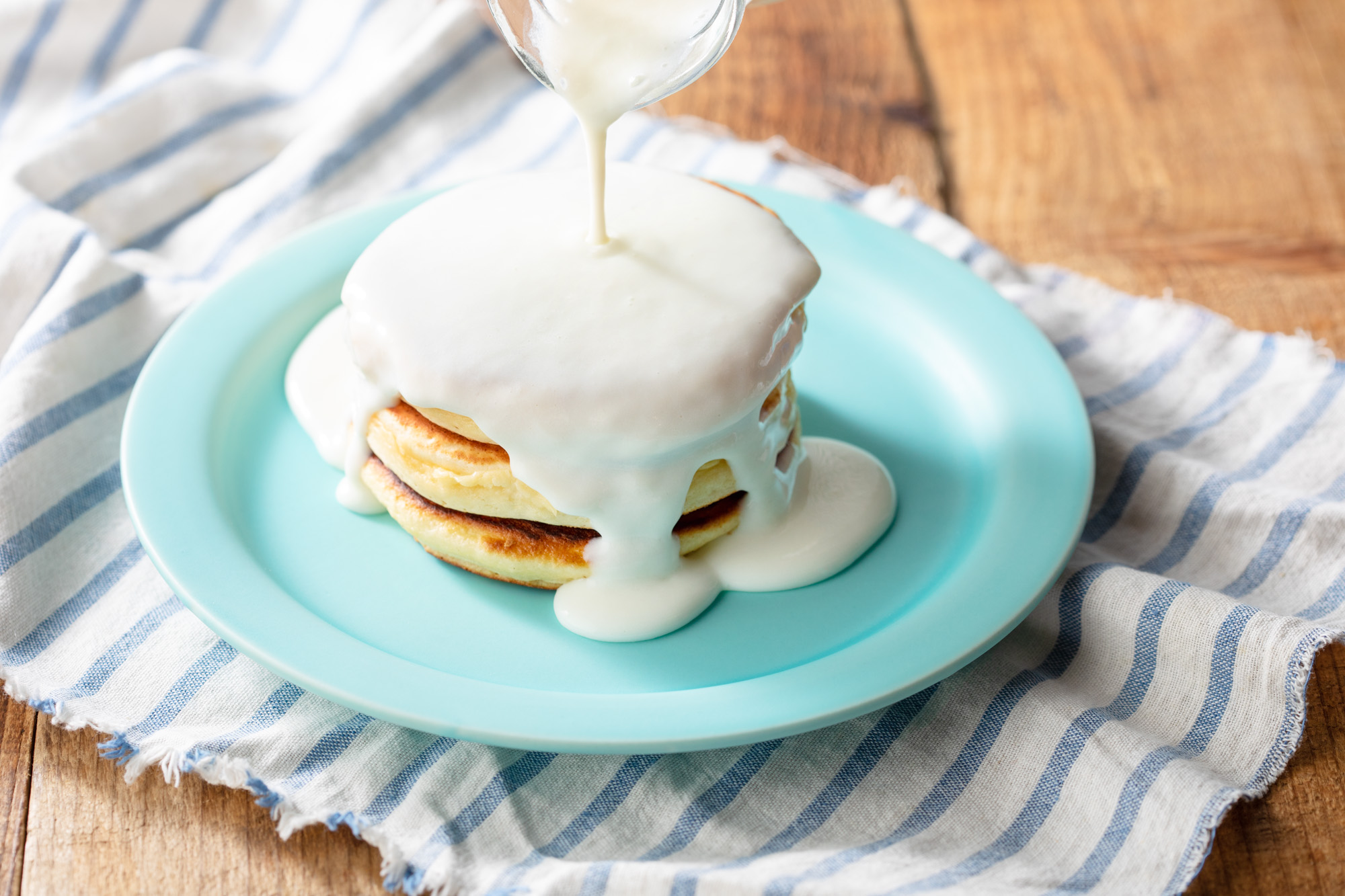 新商品は特濃ミルクソースたっぷり焼き立てふわふわのパンケーキ 原宿の生クリーム専門店は新作パンケーキ2種を販売いたします 11月7日 木 よりスタート 株式会社 オペレーションファクトリーのプレスリリース