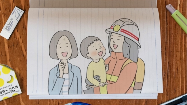 笑顔の親子と消防隊員