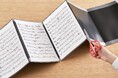 書類を入れたまま文字を書き込める「カキコ」シリーズに、楽譜での使用に特化したタイプが新登場!「カキコ ジャバラホルダー」「カキコ 楽譜ホルダー」発売