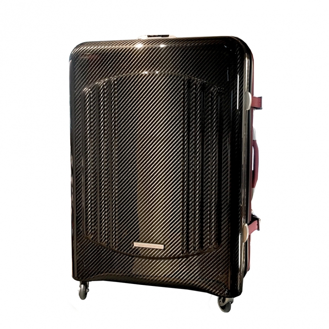 リアルカーボンファイバーと手縫いレザーを融合させた新時代のスーツケース(100万円～)