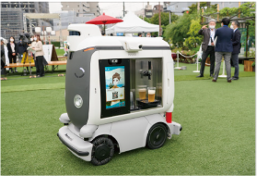 ▲アバターと自動搬送ロボットによる新たな接客販売体験