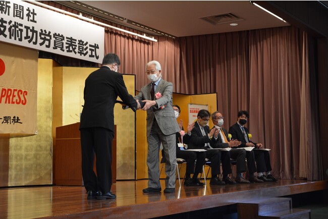 表彰式の様子 元会長である石井健太郎氏が参加