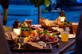 おふろcafe ハレニワの湯の屋上で、暑さを避けたナイトBBQを提供中。BBQ後はおふろでさっぱり。団体・貸切予約も承っています