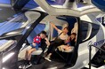 大阪・関西万博の展示施設「空飛ぶクルマ ステーション」、空飛ぶクルマ【SKYDRIVE】フルスケールモックの搭乗体験者2万人突破!
