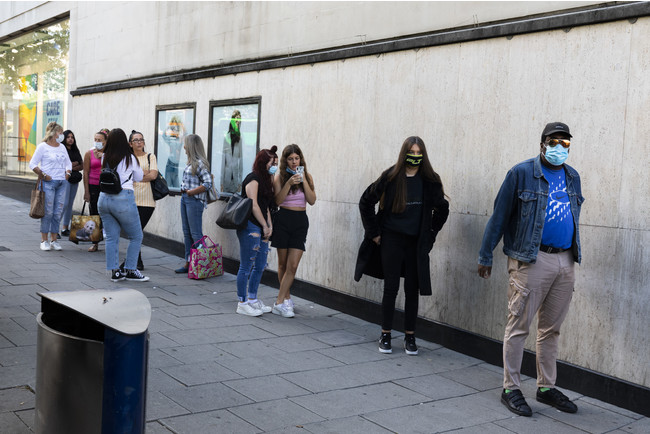 During the coronavirus outbreak, Primark queue, Bristol, England, 2020 © Martin Parr／Magnum Photos