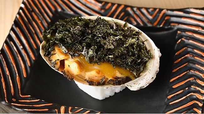 「分とく山」名物の鮑磯焼き 