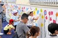 “暑さに効くアート”で地域をカラフルに!宮崎市の子どもたちとの塗装イベントを実施しました