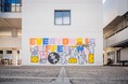 アーティスト 松本セイジ氏が描く巨大壁画が大阪芸術大学のキャンパス内に登場! ~「EVERYONE IS DIFFERENT」のメッセージとねずみのANDYが学生にエールをお届け~