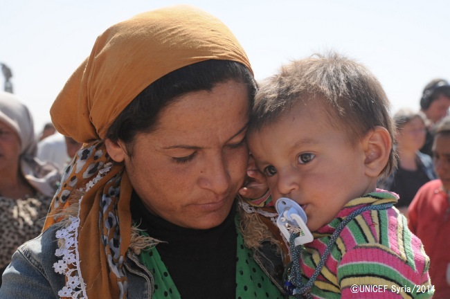 シリアからトルコへ避難してきた親子。©UNICEF Syria/2014