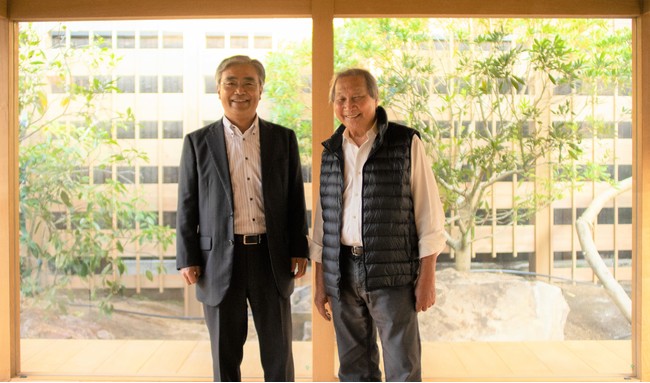 左：東京建物 代表取締役社長執行役員 野村 均、右：Azumi 会長　エイドリアン・ゼッカ