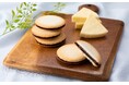 常温お手土産・ギフトで好評のシリーズに新フレーバー「キャラメルチョコサンドクッキー北海道チーズ」新発売