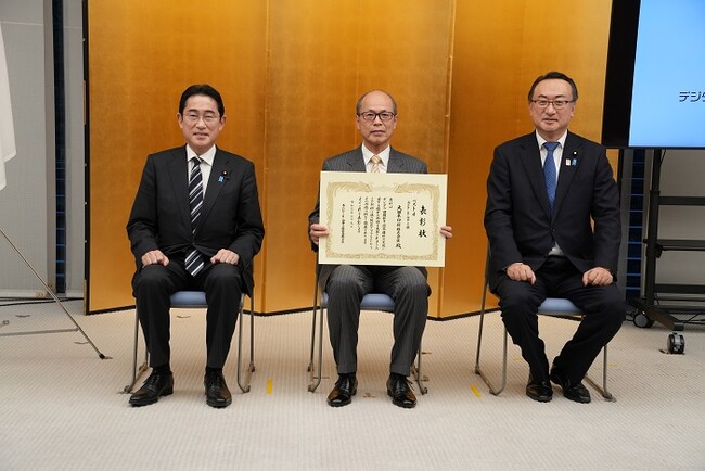 DNP代表取締役専務・宮（中） ※写真は内閣官房デジタル田園都市国家構想実現会議事務局提供