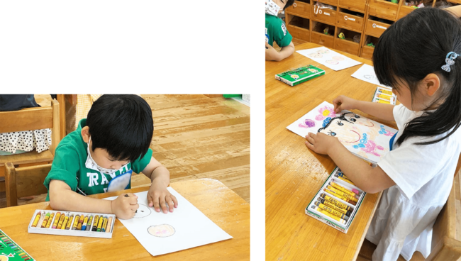 真剣な表情で似顔絵を描く子どもたち 真剣な表情で似顔絵を描く子どもたち