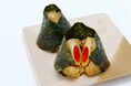 トロッとした大きな煮卵がおにぎりの中に入った「煮〜たま卵太郎」