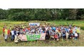 20周年を迎えた「NEC田んぼ作りプロジェクト」の稲刈りイベントを実施