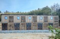 島根県海士町に「ボックスユニット工法」を用いた二階建および平屋の単身者向け居住施設（計15戸）が完成