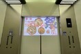 プロジェクションメディア「エレシネマ」「エレビGO」を物流施設に日本初導入東京流通センター 構内一帯に展開