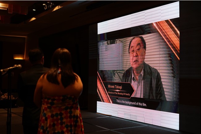 メッセージ動画で受賞の喜びを語る高木裕己監督 メッセージ動画で受賞の喜びを語る高木裕己監督