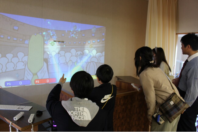 【レモンガス株式会社】ガス展示会で異色のコラボ！中・高校生が開発した「デジタル射的」で、多世代が交流するeスポーツ体験イベントを開催