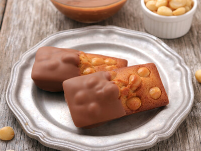 〈ノワ・ドゥ・ブール〉は銀座三越『銀座スイーツコレクション 2026』に出店し、限定商品の「焼きたてフィナンシェ（マカダミアショコラ）」や「ガトー・ショコラ（キャラメルナッツ）」を販売します。