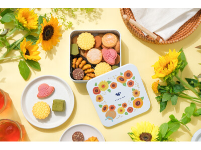 【ひまわり畑で見つけた、夏のおやつ】レモン・パイナップル・抹茶など夏らしい7種の味わい。『るんっと夏へ出かけるクッキー缶』をスナックミーオンラインストアにて期間限定発売