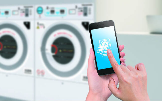 コインランドリー業界に新提案。山本製作所が、業界初のスマートサービスを公開