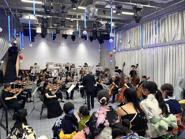「こども音楽食堂」の活動が広がる。門前仲町の夏祭りに30名のオーケストラが登場【シルバーバックスプリンシパル・グループ】